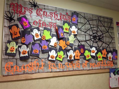 Halloween bulletin board. "Caught in a web of reading". | Halloween ...