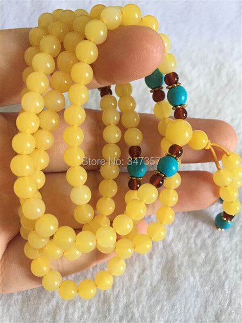 Beautiful Buddhism 8mm* 108 Prayer Beads Elastic Thread Yellow Color Resin Materials Rosary for ...