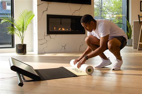 This smart fitness mat has an attached display & webcam to give you virtual training at home ...