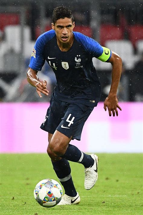 France's defender Raphael Varane runs with the ball during the UEFA ...