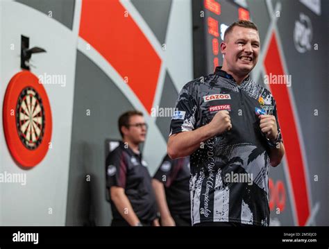 Chris Dobey celebrates winning against Gary Anderson during day eleven ...