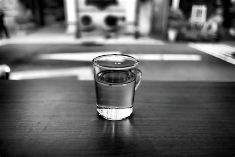 Grayscale Photo of Lady Drinking Water · Free Stock Photo