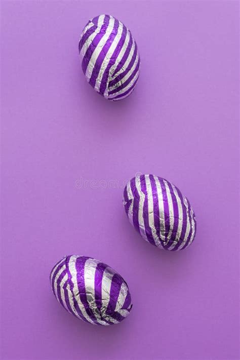 Chocolate Easter Egg with Purple Foil Wrapper Stock Image - Image of foil, purple: 51264749
