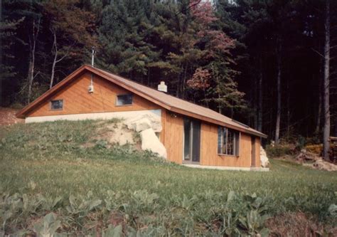 My first home. Passive solar earth bermed ranch in Grafton, NH. Owner designed and built ...