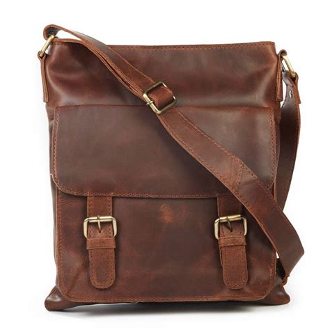 leather cross body messenger bag by the leather store | notonthehighstreet.com