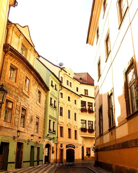 Pastel coloured buildings and gothic architecture around Prague Old ...