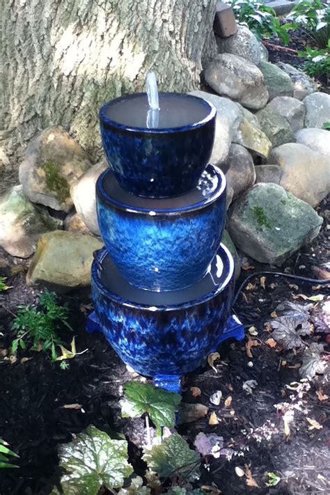 18 Outdoor Fountain Ideas - How To Make a Garden Fountain for Your Backyard