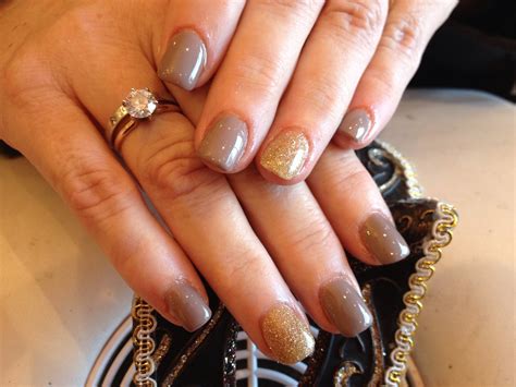 Acrylic nails with wild mink gel polish and gold glitter r… | Flickr