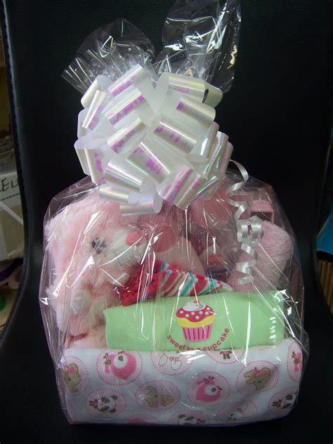 Baby basket for a baby shower or new born girl. #babyshower #babygirl # ...