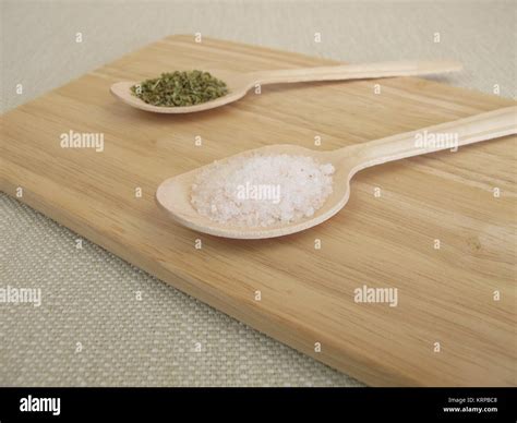 replace salt with herbs Stock Photo - Alamy