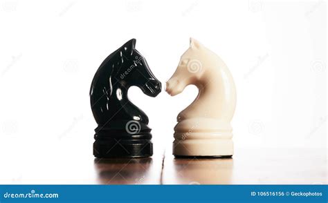 Close Up of Black and White Chess Knight Pieces Stock Photo - Image of concept, white: 106516156