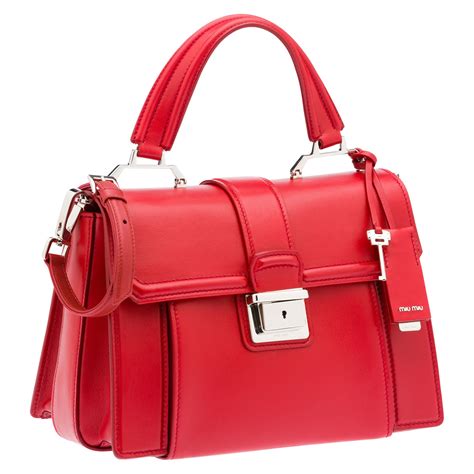 Miu Miu's top handle bag is a red hot pick for summer - Luxurylaunches