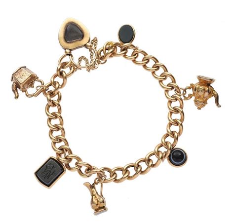 Antique Gold Charm Bracelet with Various Charms - Bracelets/Bangles ...