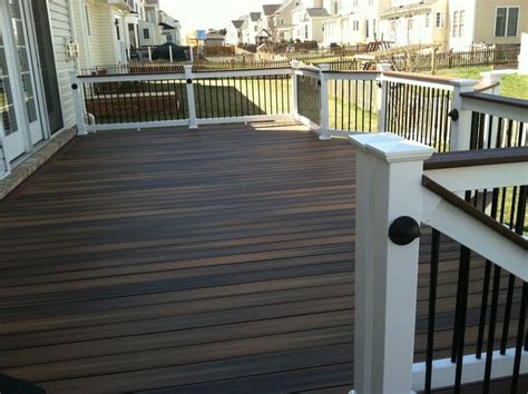 A Fiberon Deck with Shoreline Series 200 railings with black balusters ...