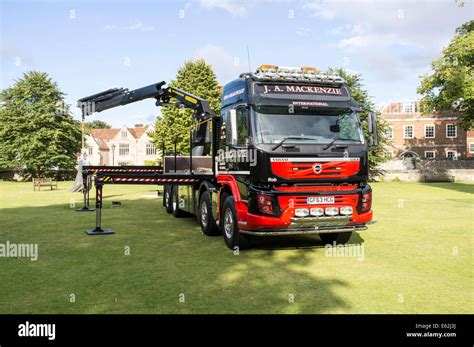 Volvo truck with Palfinger crane with stabilizers extended Stock Photo ...