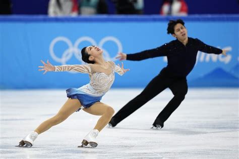 Sui Wenjing and Han Cong win skating gold at 2022 Olympics - Los Angeles Times