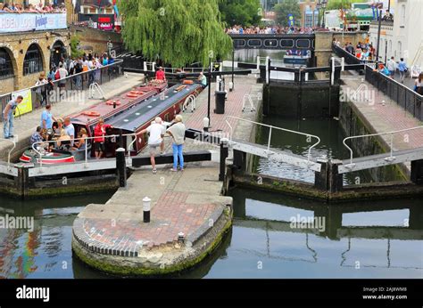 canal boats in camden town lock and market in london Stock Photo - Alamy