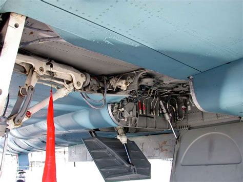 the inside of an airplane with some wires attached to it