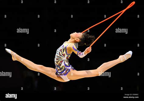 woman doing rhythmic gymnastics with rope Stock Photo, Royalty Free ...