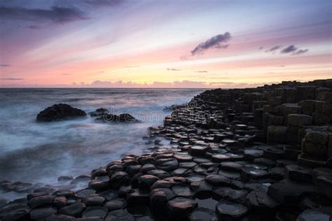 Sunset at Giant s Causeway stock image. Image of tourism - 64380375