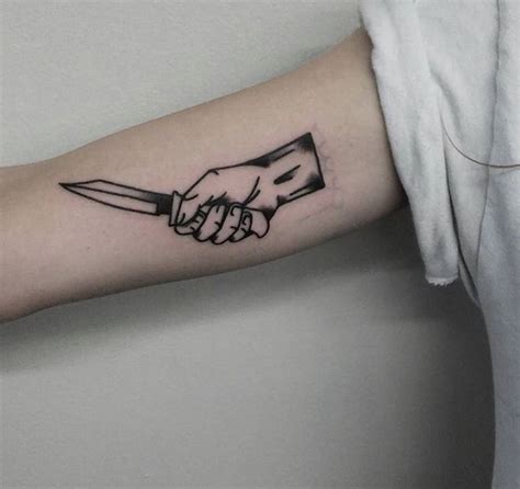 Blackwork style tattoo of a hand holding a knife | Traditional tattoo, Knife tattoo, Hand tattoos