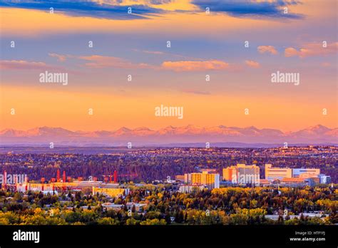 Calgary skyline at sunrise Stock Photo - Alamy