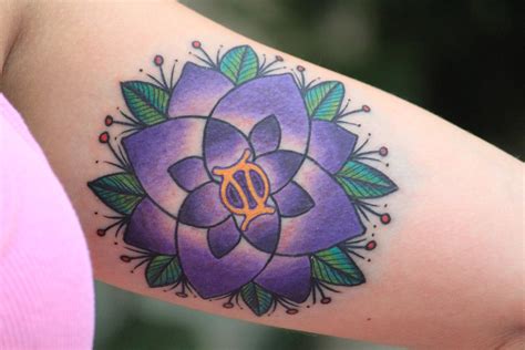 Purple flower gemini by Patrick Sweeney: TattooNOW