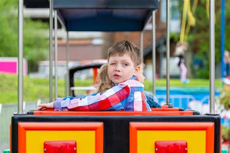 Happy Child Boy Having Fun in Park. Taking a Ride on Baby Train Stock ...