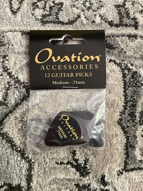 Ovation Accessories Pack of 12 Guitar Picks - Medium .71 mm | Reverb