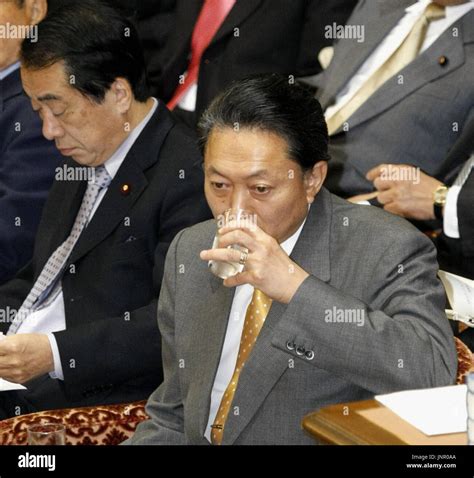 TOKYO, Japan - Japanese Prime Minister Yukio Hatoyama takes a sip of ...