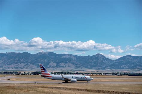 Bozeman montana airport and rocky mountains Photograph by Alex ...