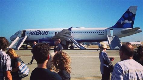 JetBlue Plane Evacuates Passengers Via Slides After Emergency Landing ...