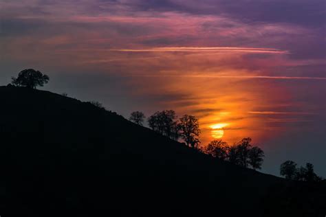 Hillside Sunset Photograph by Patti Deters - Fine Art America