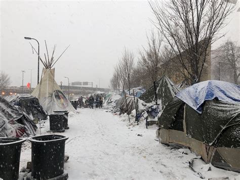 Minneapolis firefighters start fire watch at homeless encampment | MPR News