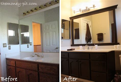 There are a ton of tutorials out there on how to frame a plate glass bathroom mirror using trim ...