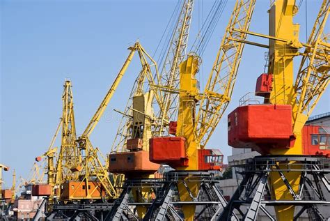 Industrial cranes on dock stock photo. Image of background - 25518046