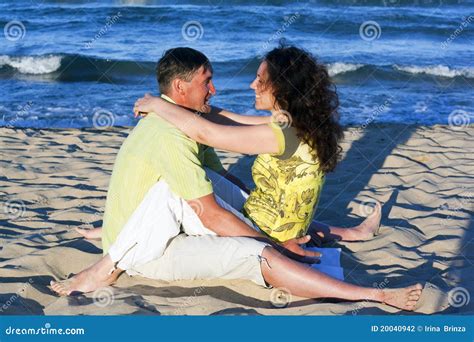 Man and Woman Couple in Romantic Embrace on Beach Stock Photo - Image of romantic, seaside: 20040942