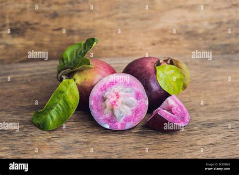 fresh Chrysophyllum cainito fruits on wood background Stock Photo - Alamy