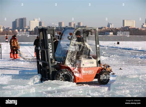 More than a dozen mining icemen work hard to harvest ice cubes in ...