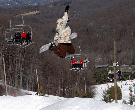 Enjoy skiing or snowboarding on over 86 acres of slopes, trails, and terrain parks at Bear Creek ...