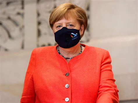 Coronavirus: Angela Merkel seen wearing face mask in public for first time following accusations ...