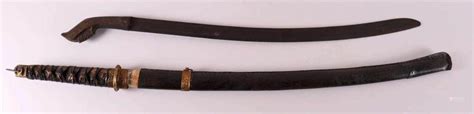 51BidLive-[A katana in a case + klewang, Indonesia, 20th century.]