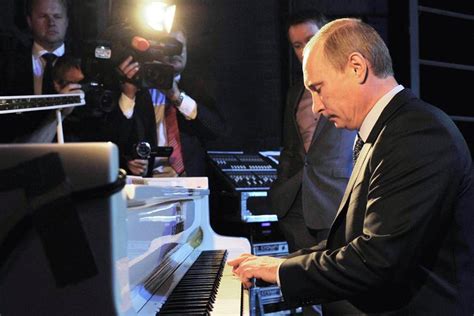 Putin plays it again but the song remains the same at visit to theatre ...