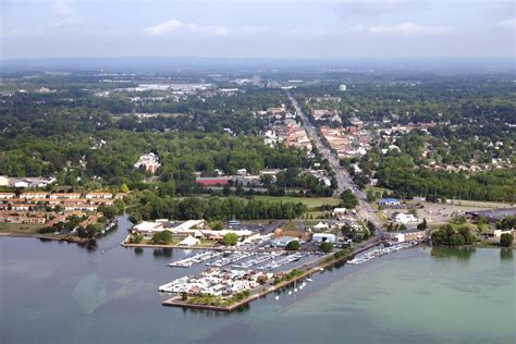 an aerial view of a marina with boats in the water