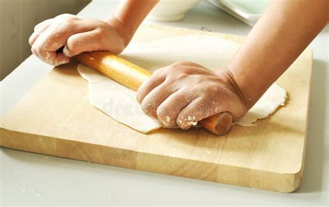 Roll Out Dough with Rolling Pin Stock Image - Image of closeup, cook ...