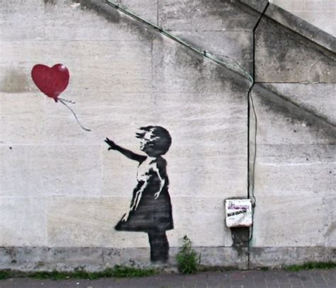 This is Banksy's most famous street art piece: Balloon Girl. This graffiti is located in London ...