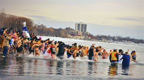 Canadians from coast to coast take part in annual Polar Bear Dip | CTV News