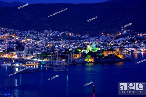 View of Bodrum harbor and Castle of St. Peter by night. Turkish Riviera ...