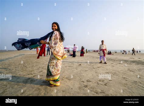 Women are drying her saris on the beach of Ganga Sagar, celebrating ...