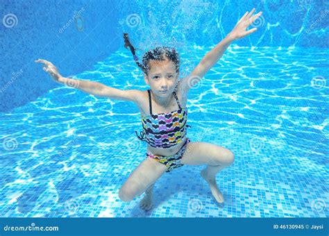 Happy Active Underwater Child Swims in Pool Stock Image - Image of ...